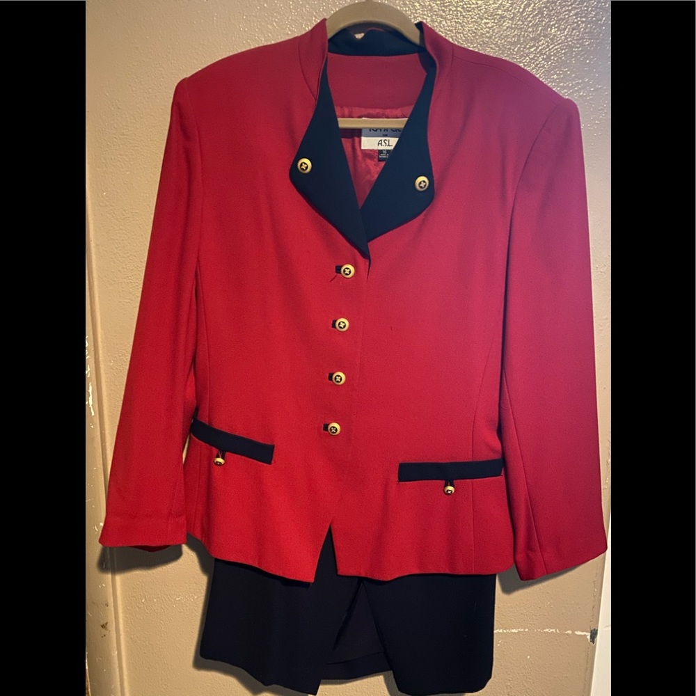 Red and navy suit jacket and skirt